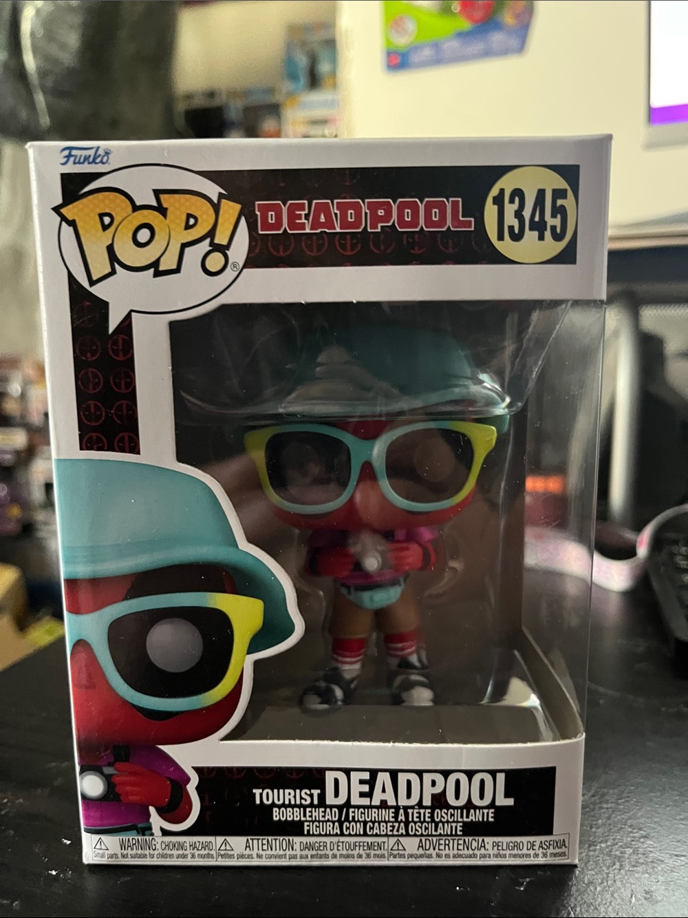 Funko Pop! Deadpool #1345 — Teal, Yellow, Red, Pink Sunglasses Variant
